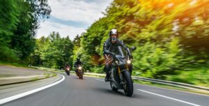 3 motorcyclists on backroad