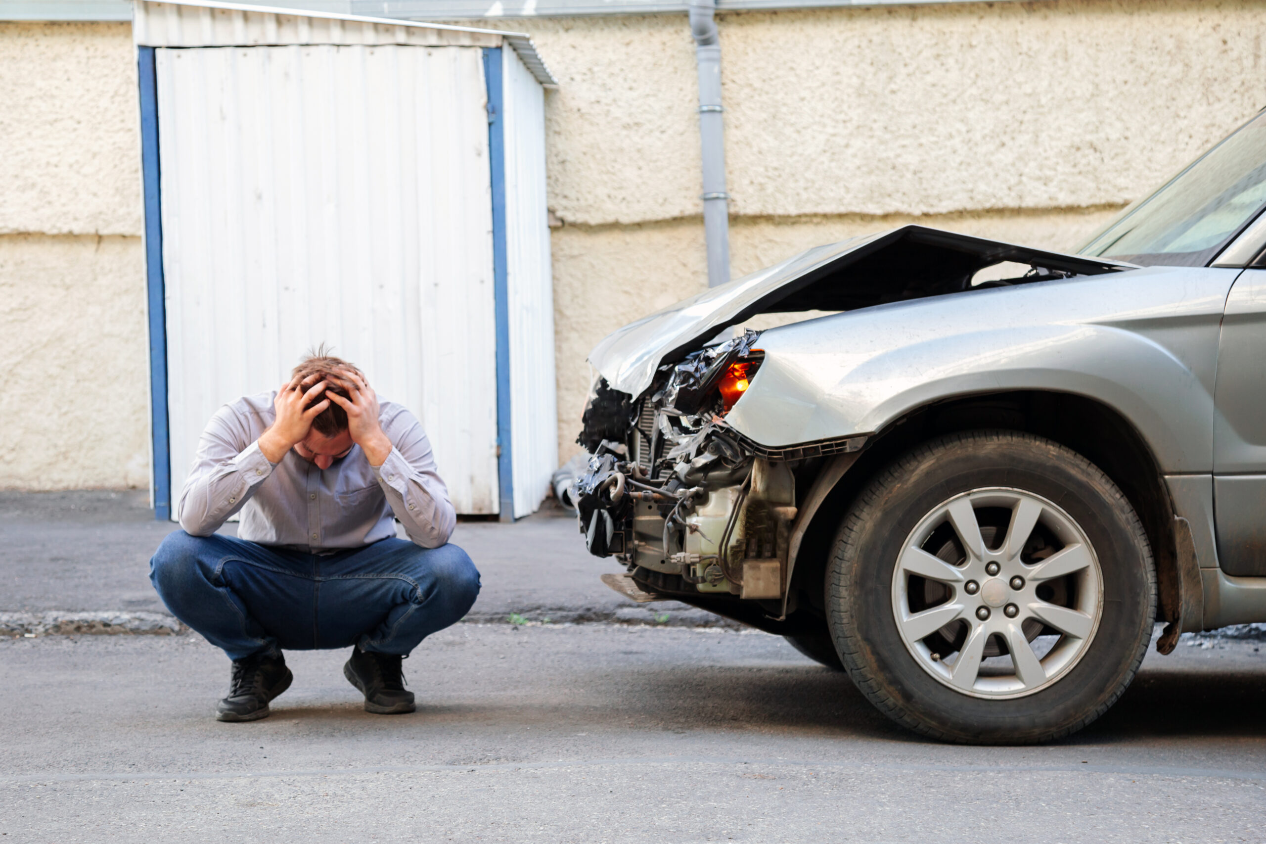 person upset about car accident